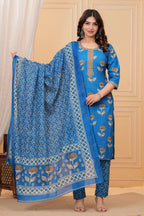 Woman wearing a bright blue handblock printed cotton kurta set with a coordinated Kota Doriya dupatta featuring floral motifs.
